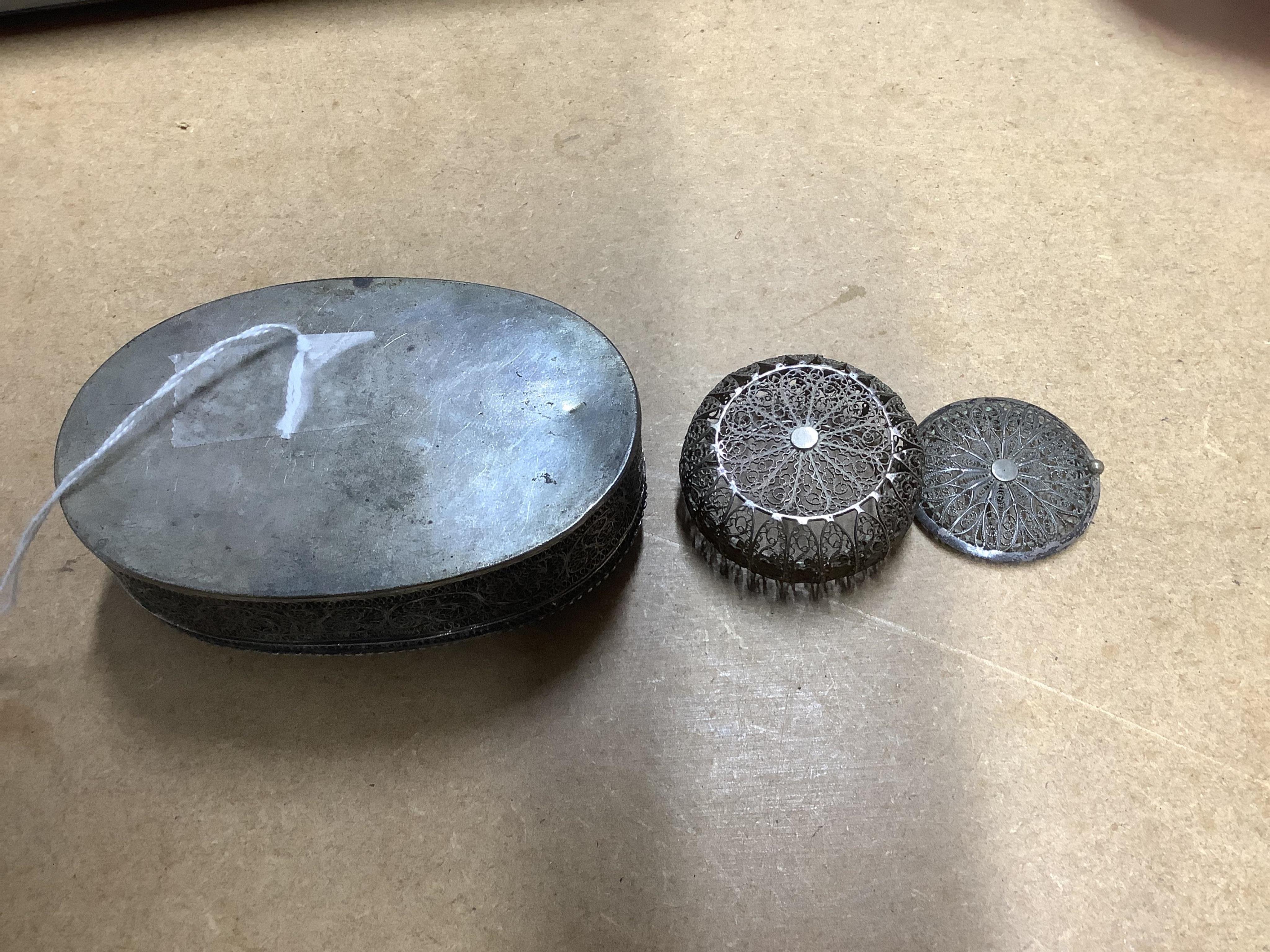Two Indian filigree white metal boxes, the largest 95mm